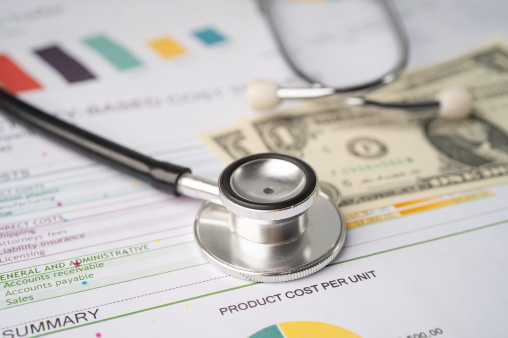 Stethoscope and US dollar banknotes